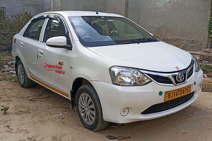 Rajasthan Visits white sedan taxi for Agra taxi service